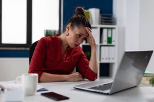 Home Page 26 Woman stressed over laptop
